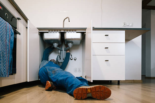 Professional Drain Cleaning technician working in Capeville, VA